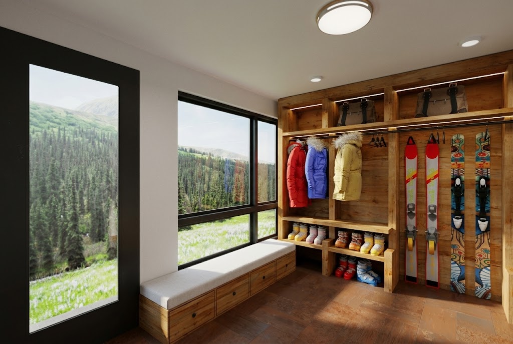 Ski-in mudroom with bespoke storage for skis, boots, and outerwear